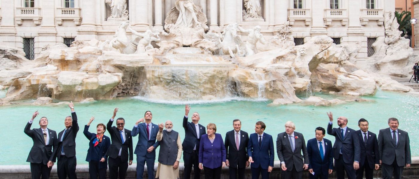 G20 leaders throw coins into the Trevi Fountain