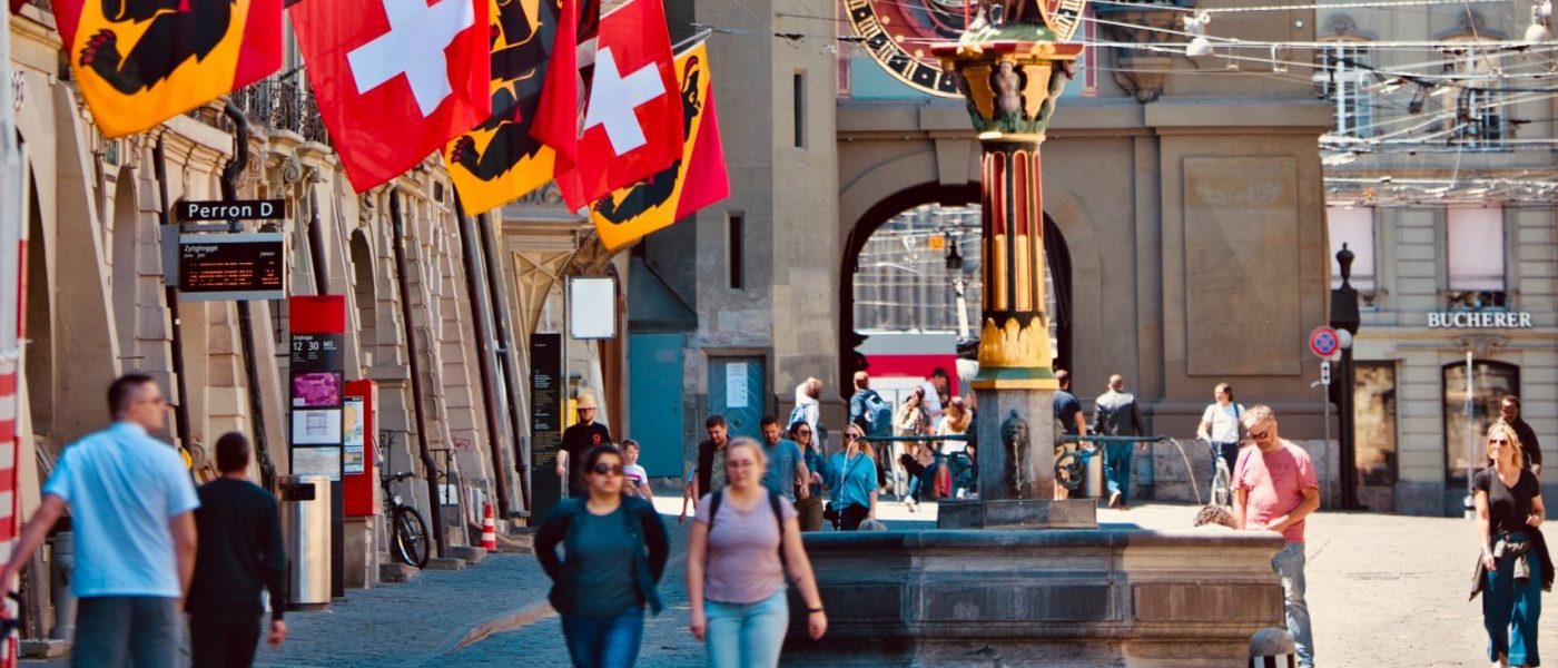 Pedestrian street and clocktower in Bern, Switzerland
