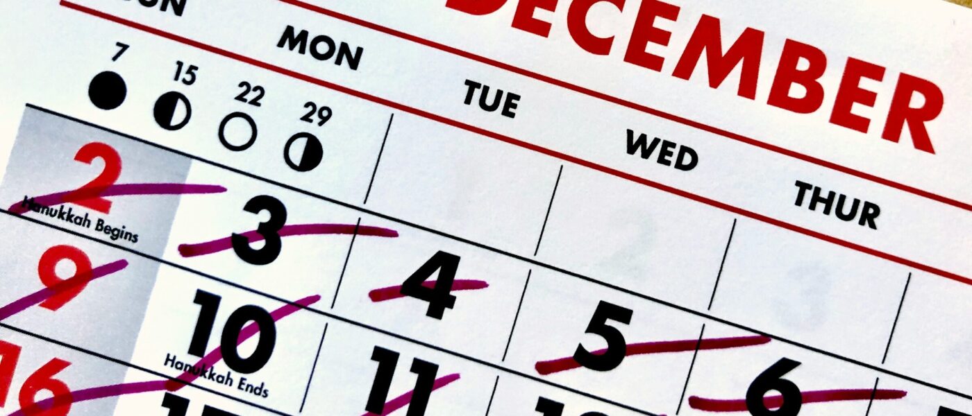 A calendar sheet with the dates marked off