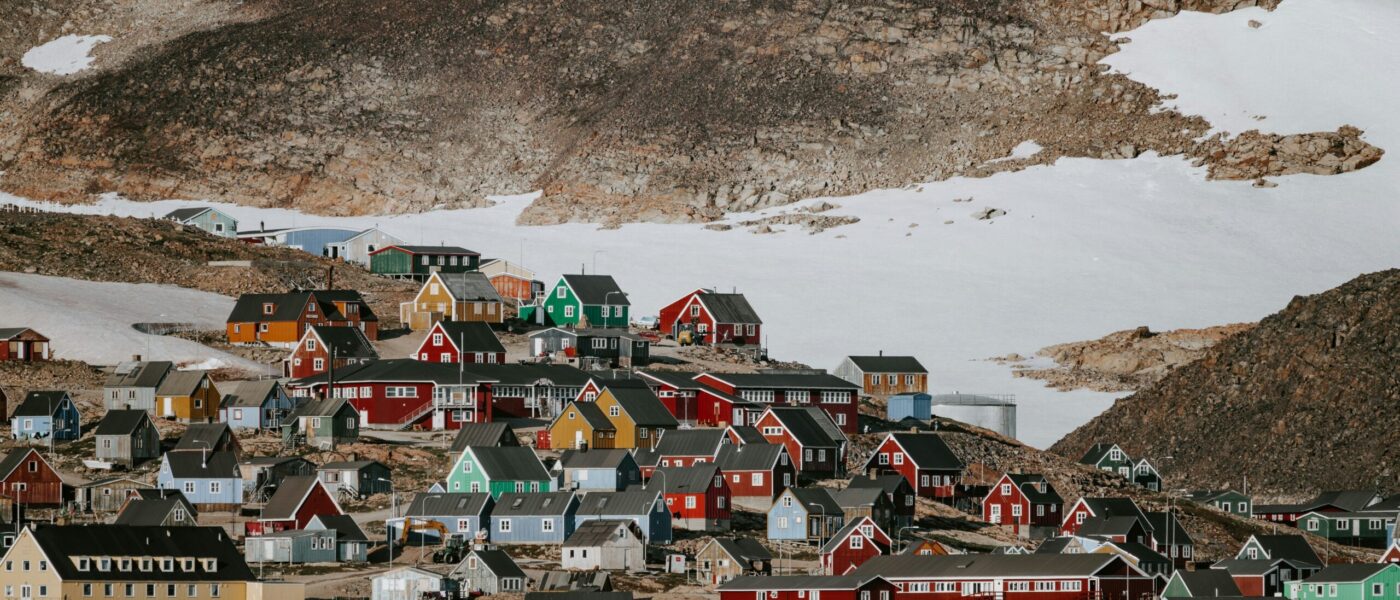 Colourful houses on a snowy coastline in Greenland