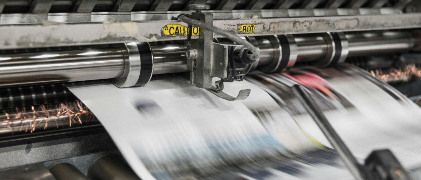 A newspaper being printed - UNSPLASH A newspaper being printed