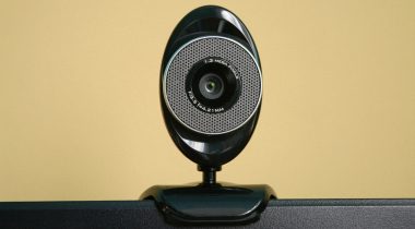An oval shaped black web camera